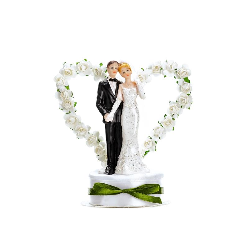 Kakefigur - brudepar med blomsterhjerte